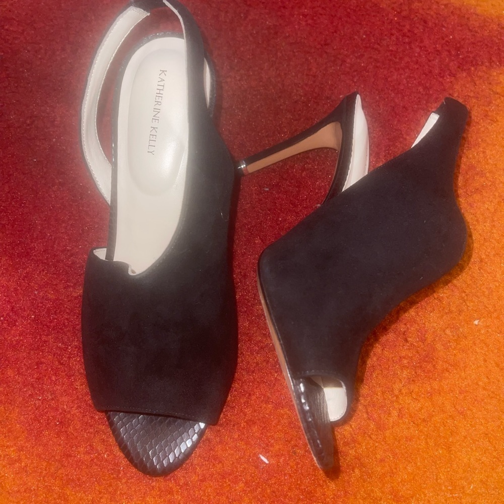 Black sling back pumps